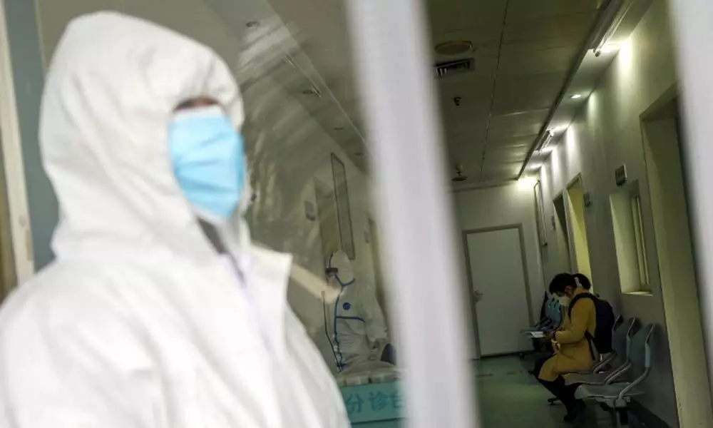 China urges citizens to delay foreign travel over coronavirus fears