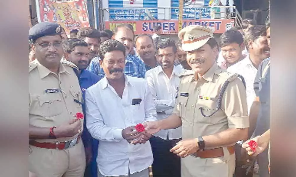 As part of Road Safety Week celebrations Gandhigiri by cops in Vikarabad