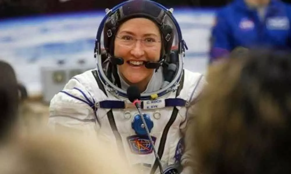 Washington: NASA astronaut who set female space record back on Earth