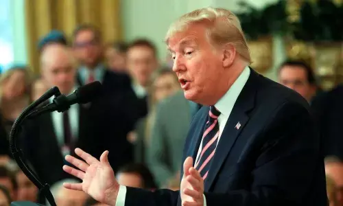 Trump says Mulvaney to remain as White House Chief of Staff