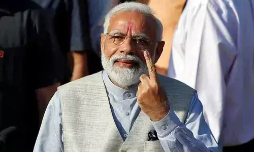 Modi, Shah urge Delhi voters to vote