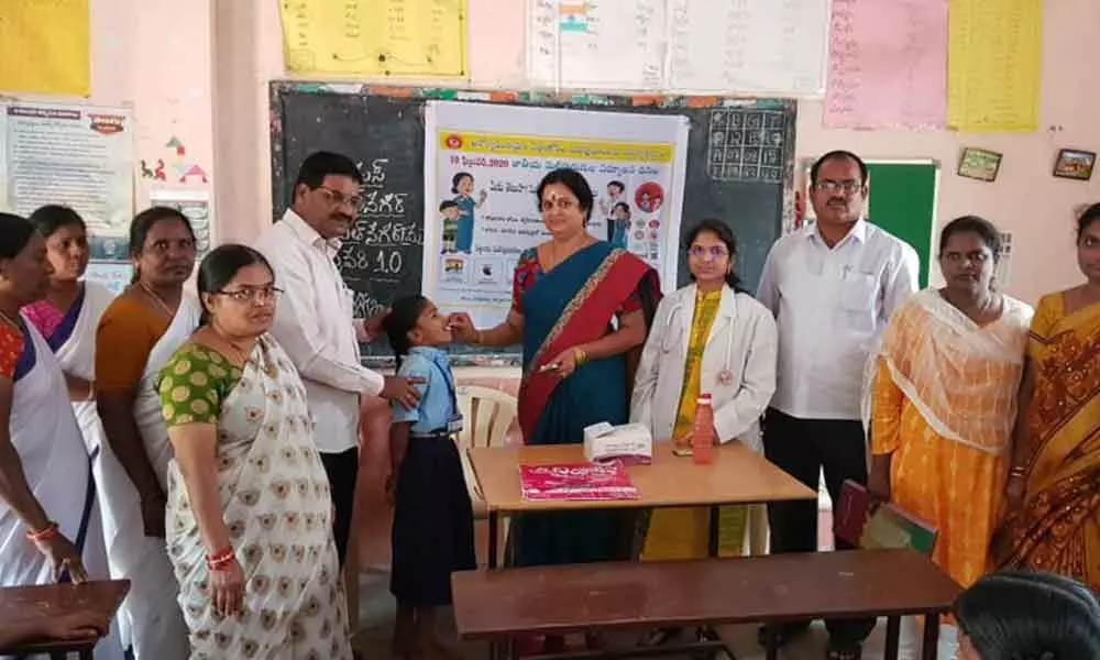Hyderabad: Corporator Lakshmi Prasanna Ram Mohan Goud administers albendazole tablets in BN Reddy Nagar