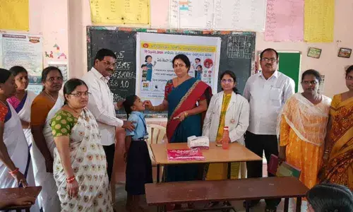 Hyderabad: Corporator Lakshmi Prasanna Ram Mohan Goud administers albendazole tablets in BN Reddy Nagar