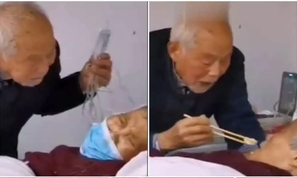 87-Year-Old Man Feeding Coronavirus-Infected Wife in Hospital, Incident wins netizens Heart