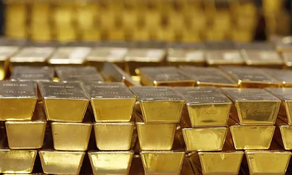 Gold, silver prices inch upwards