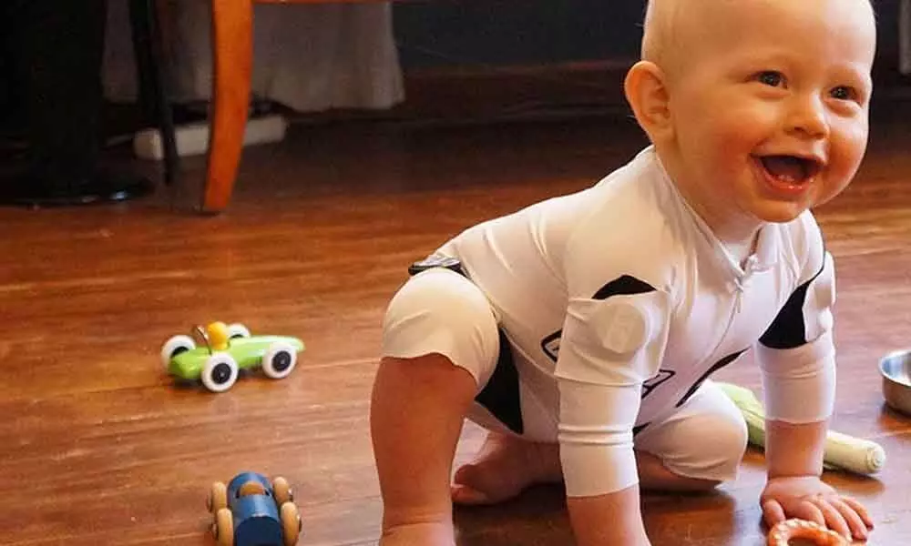 Smart jumpsuit to spontaneously measure infants movements developed