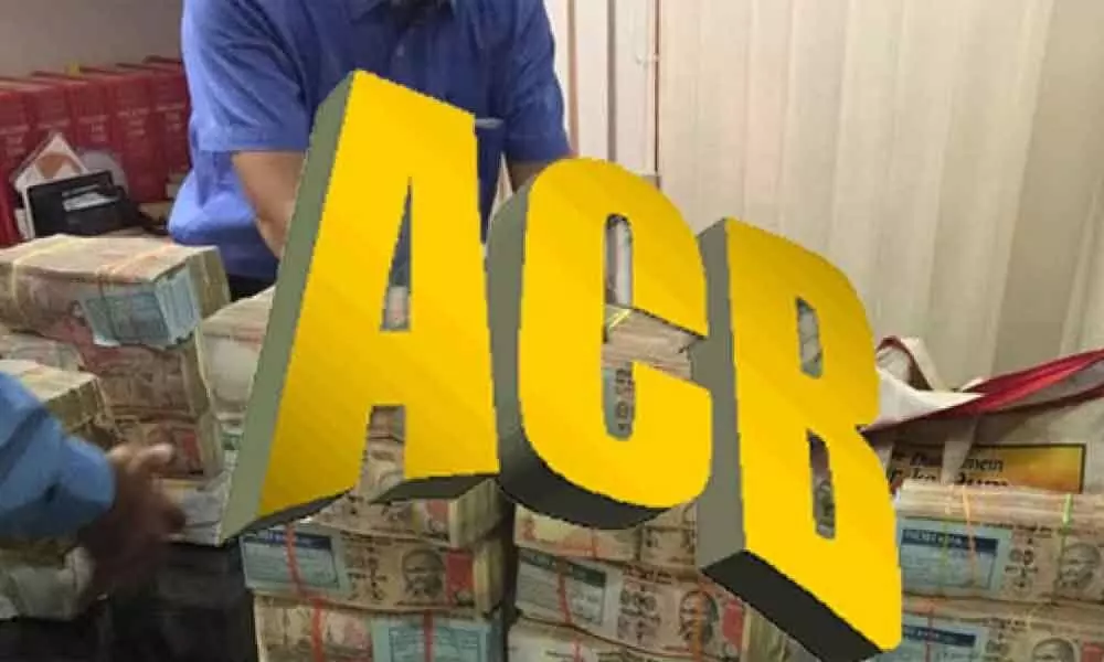 ACB sleuths held raids on Town planning section in Vijayawada