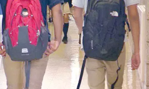 Kids carrying heavier backpacks might be healthier