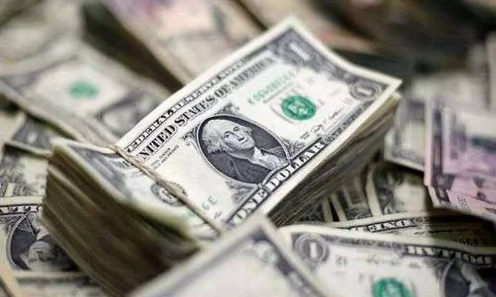 Dollar rises amid economic data