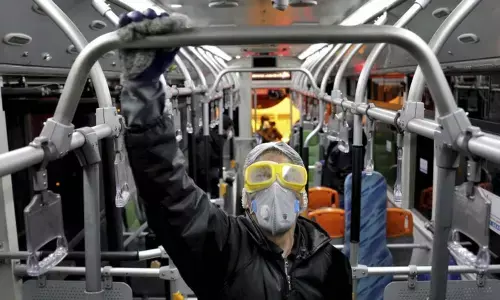 China reports 52 more coronavirus deaths, lowest in three weeks