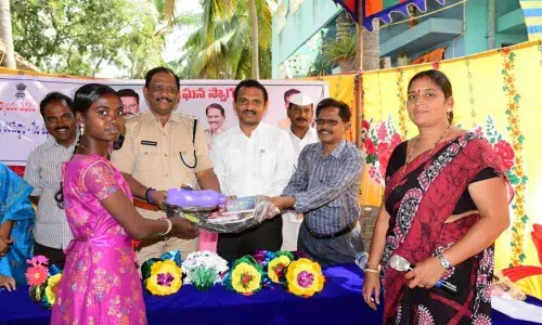 DSP, RDO distribute schoolbags in Machilipatnam