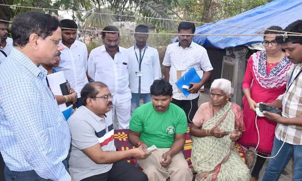 Vijayawada: District Collector Mohammad Imtiaz distributes pensions