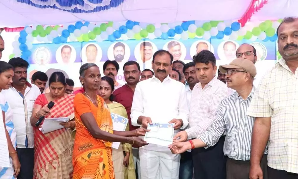 MLA Bhumana Karunakar Reddy distributes rice cards in Tirupati