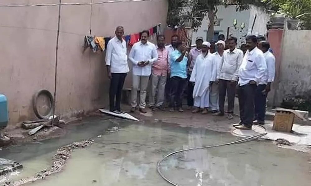 Hyderabad: Corporator V Jagdishwar Goud attends to drainage issue in Madhapur