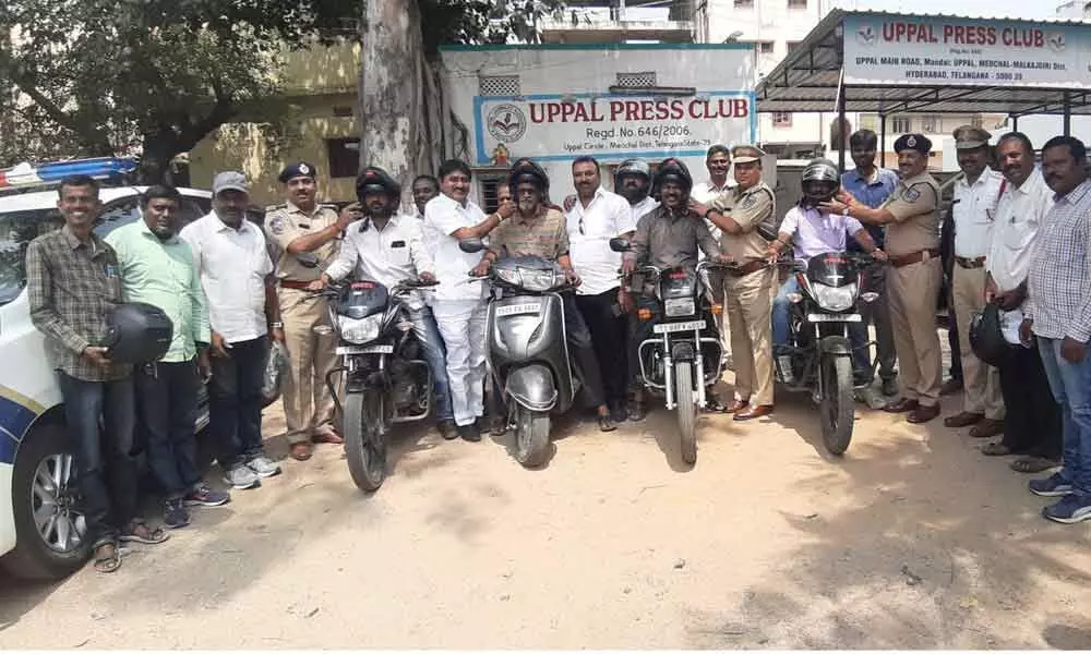 Hyderabad: Helmets distributed to journalists in Uppal