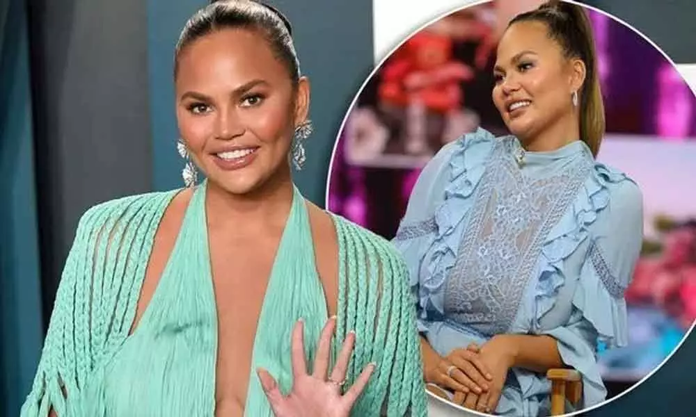 34-year old Model Chrissy Teigen admits to having breast implants and fears  having them removed