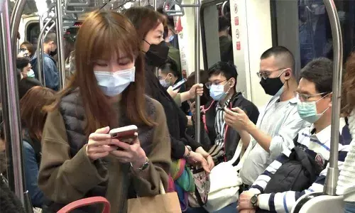 China COVID-19 cases fall below 100 as world total over 100,000