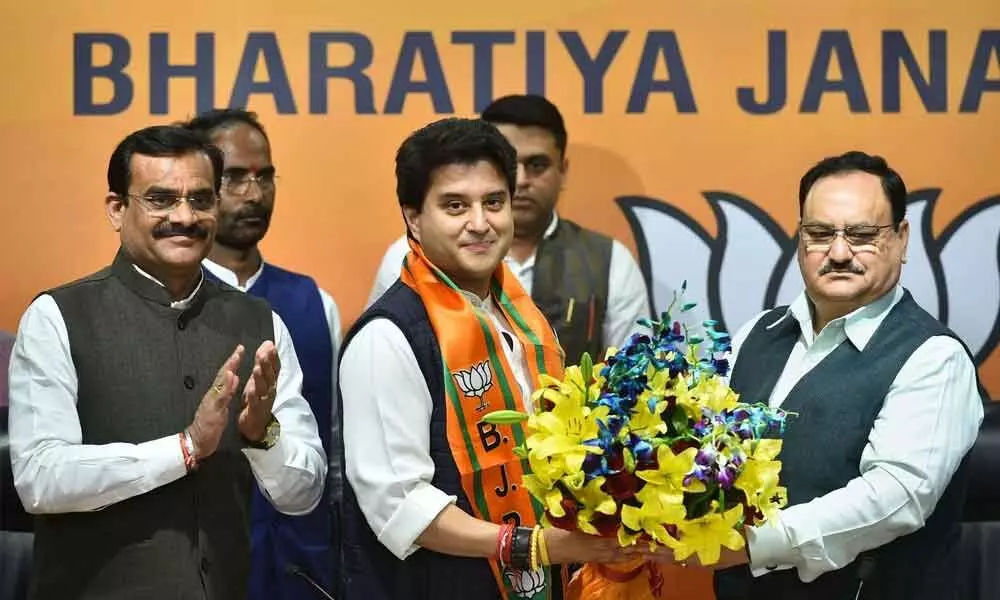 Jyotiraditya Scindia embraces BJP