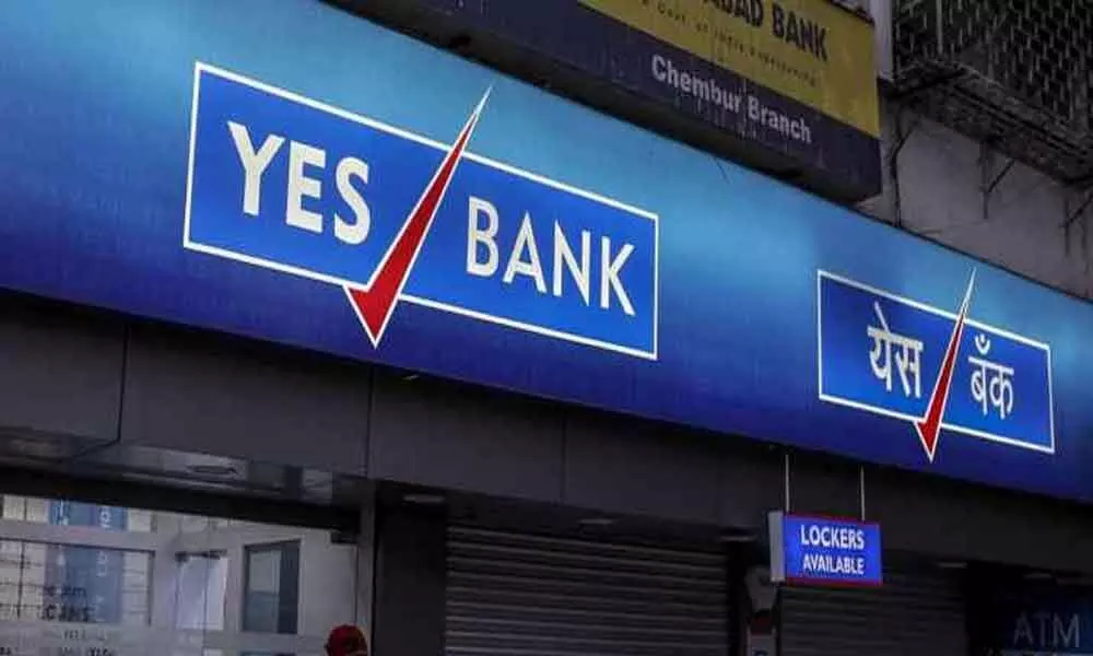 Yes Bank reports Rs 18,564-cr loss for December quarter