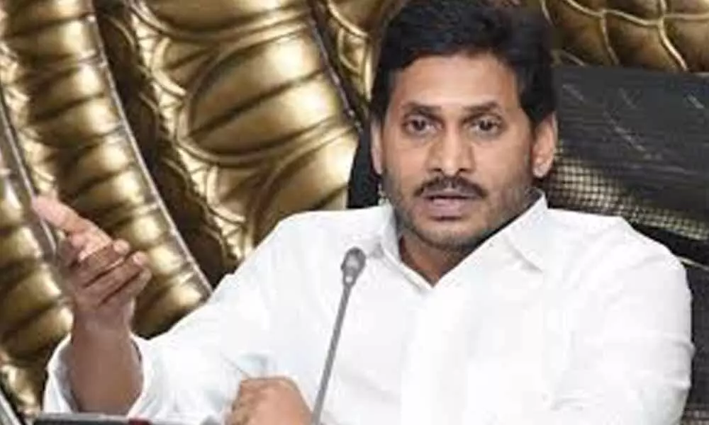 CM YS Jagan reacts on SEC for postponement of local body elections