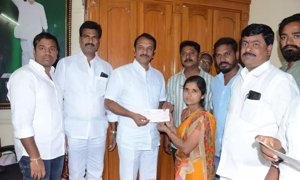 Hyderabad: MLA Devireddy Sudheer Reddy hands over CMRF cheque in BN Reddy Nagar
