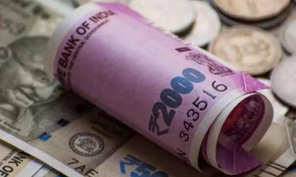 Rupee plunges 50 paise to 74.25/USD