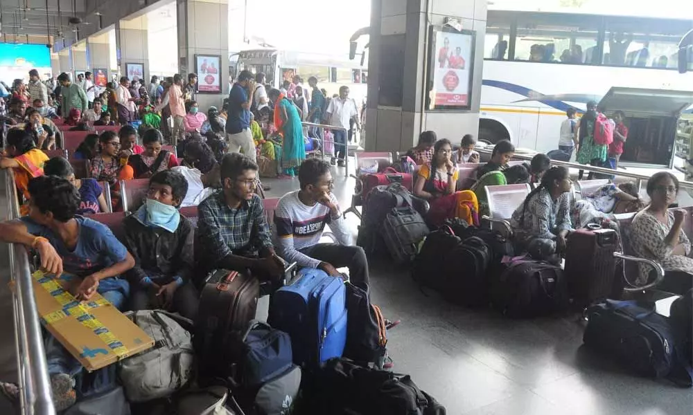 Guntur: Heavy rush of students at bus stand, railway station