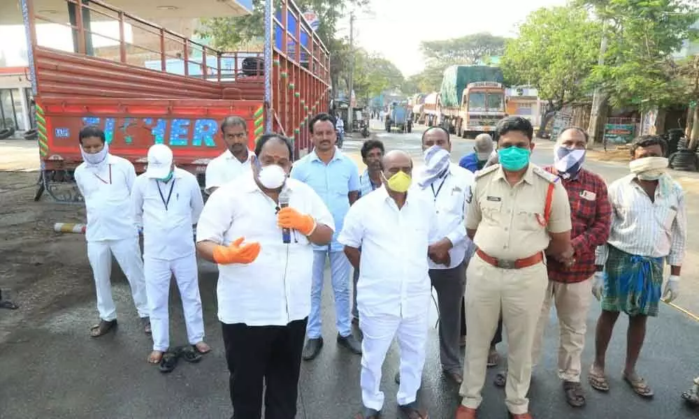 Tirupati: Municipal personnel spray disinfectants
