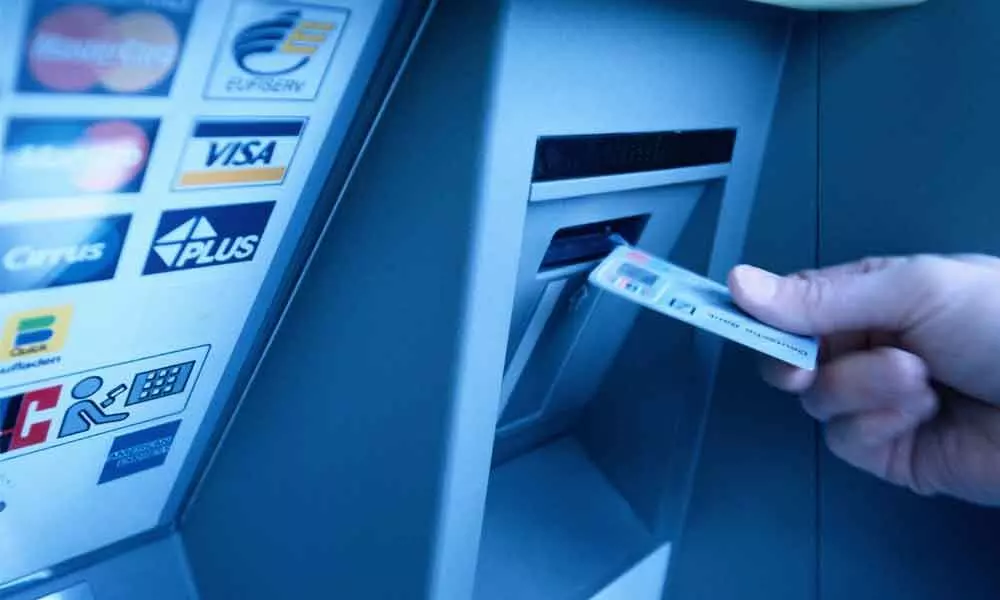 Withdraw cash from any ATM free of charge