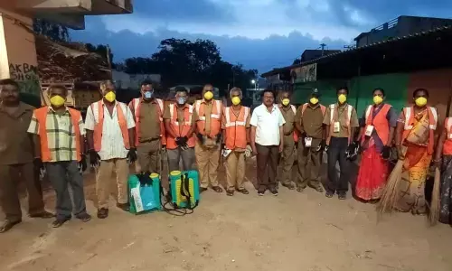 Chittoor sanitary workers take oath for not apply leave till April 15