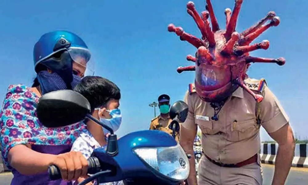 Chennai cops use coronavirus helmet