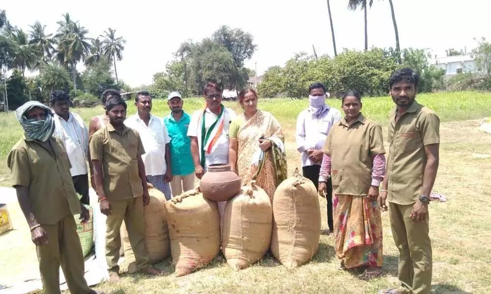 Former sarpanch donates rice to sanitation staff at Huzurnagar