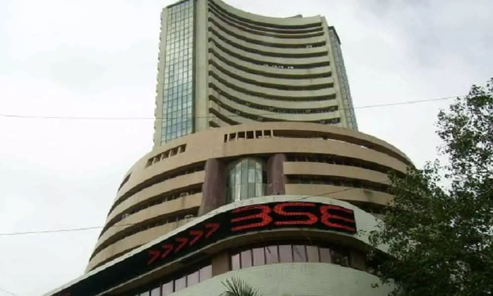 Markets rally on global cues; Sensex up 1,028 points