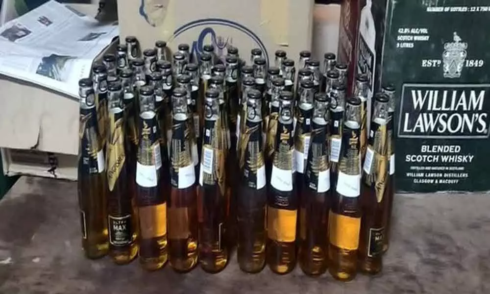 Two held, liquor worth Rs 1.25 lakh seized in Bengaluru