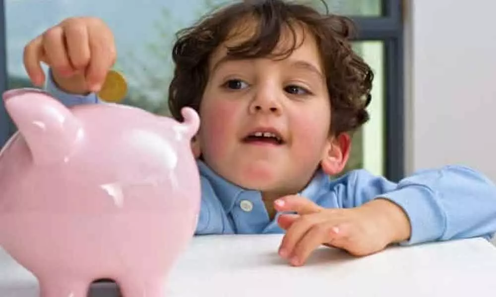 Children come forward with piggy banks