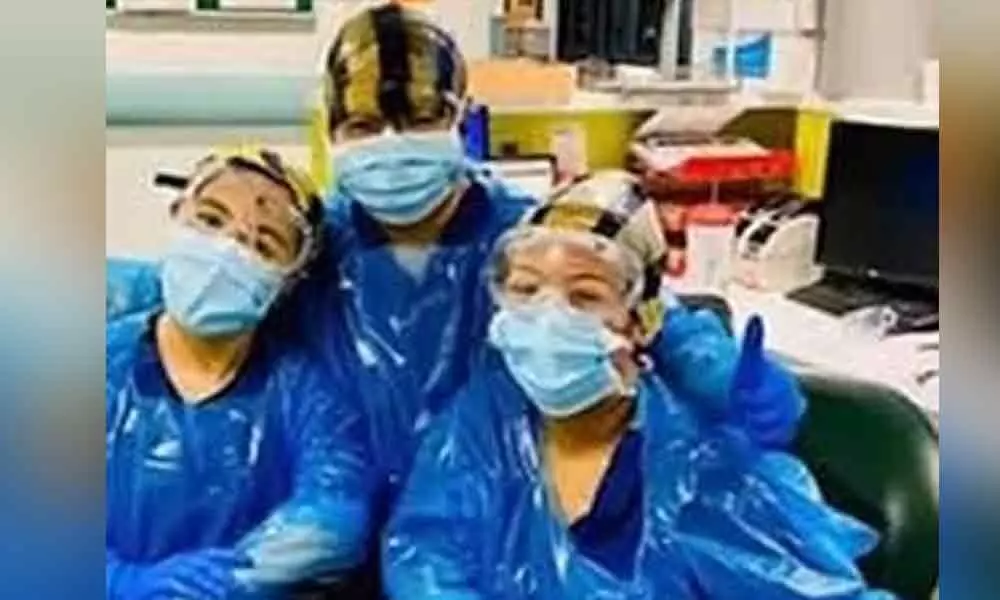 Three frontline NHS nurses who were forced to use bin bags test positive