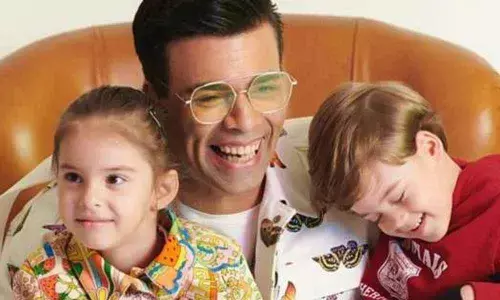 Karan Johars munchkins dont approve of his singing skills