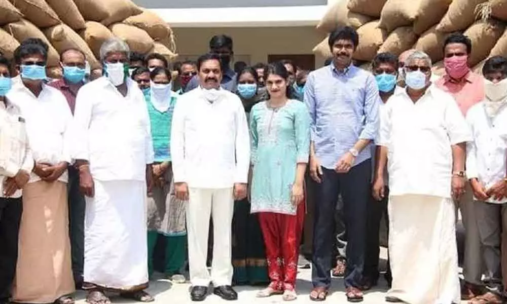 Sarvepalli YSRCP MLA Kakani Govardhan Reddys daughters donate rice bags to needy