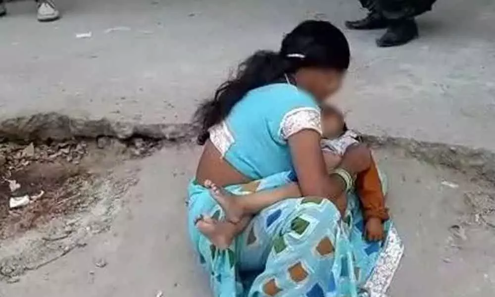 No ambulance: Woman walks with body of 3-year-old son
