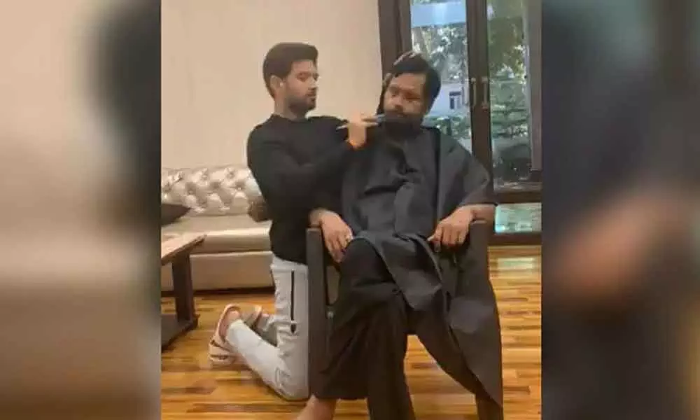Watch: Union Minister Ram Vilas Paswans son turns barber for father