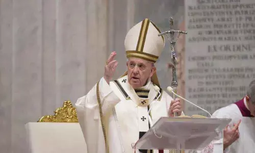 Pope urges world to unite to face pandemic