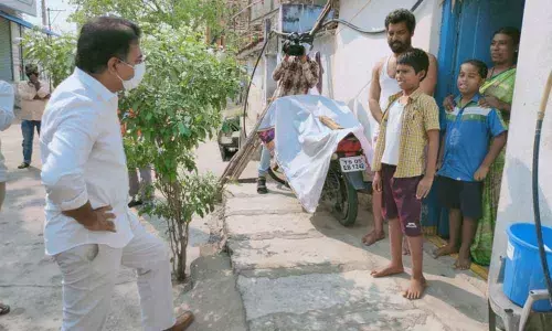 KTR visits red zone area in Vemulawada