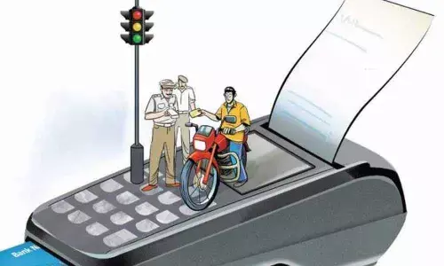 Suryapet: Motorist fined Rs 500 for not wearing mask