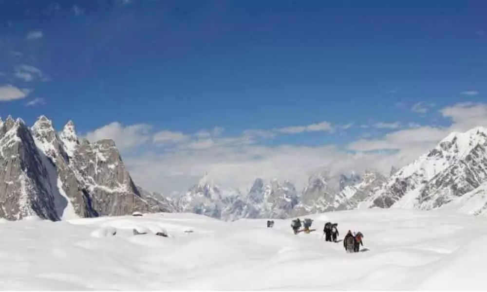 Rescued from Himalaya trials, trekkers return to find world in turmoil