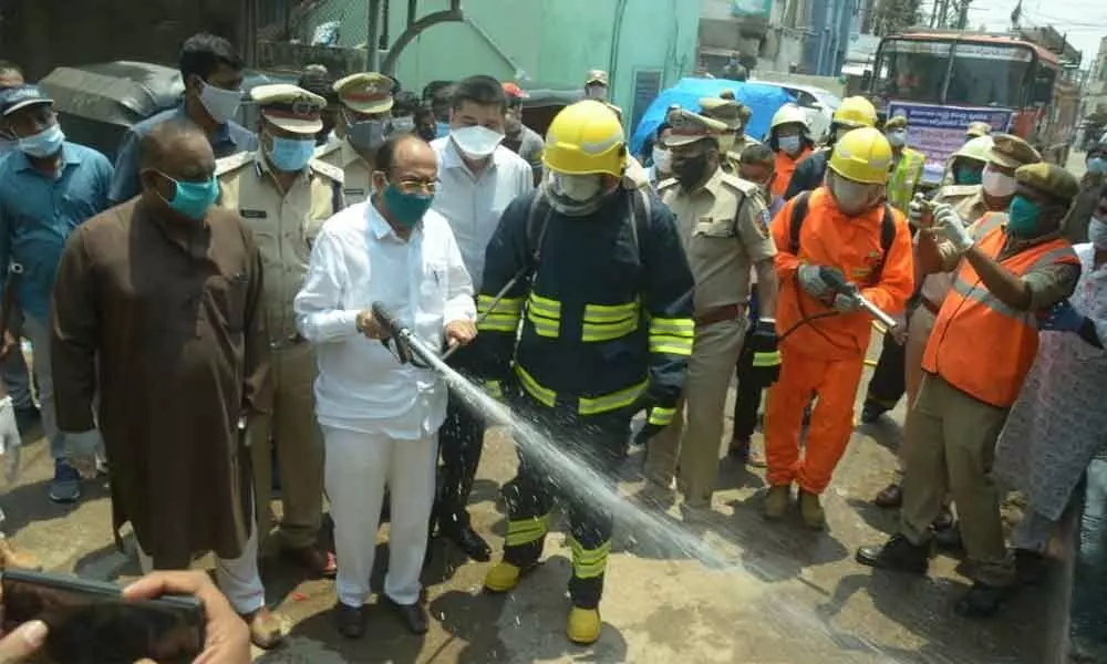 Hyderabad: Home Minister Mohd Mahmood Ali oversees disinfectant spraying