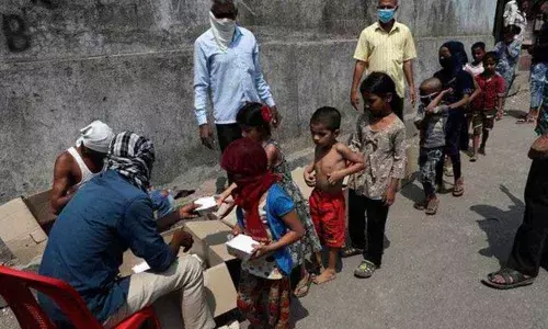 Nepali unable to attend mothers funeral, cooks food for hungry