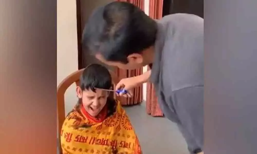 Watch: With Pair Of Scissors, UP Minister Fixes Hair Of Children At Home