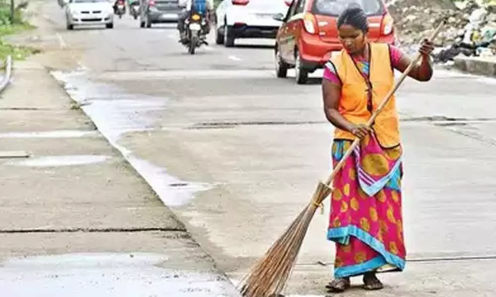 Tirupati: Sanitary staff slogging to fight Covid, waste collection takes a backseat