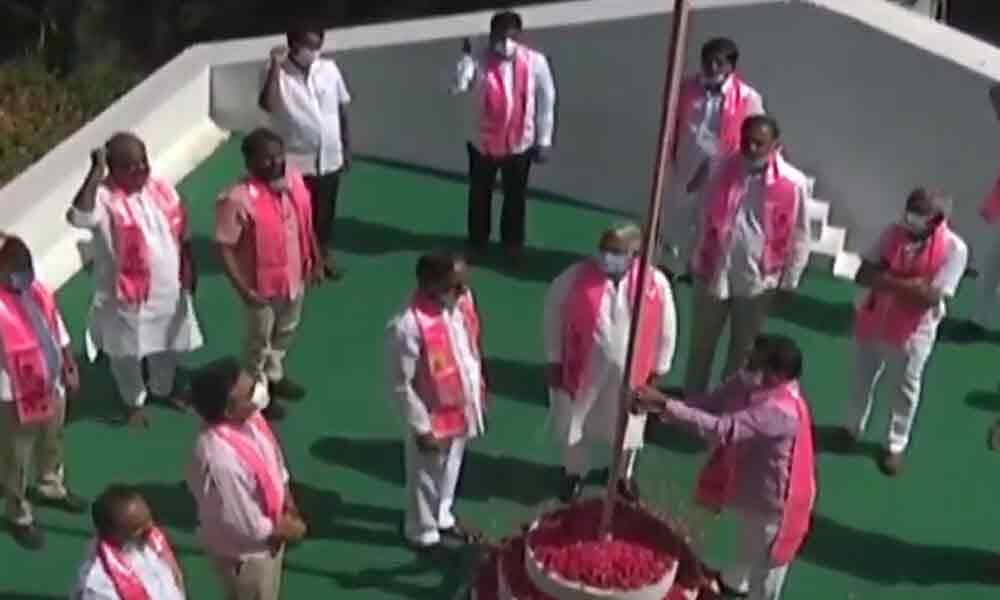 CM KCR hoists party flag on 20th TRS formation day at Telangana Bhavan
