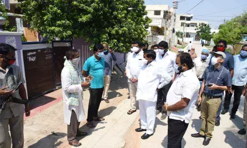 Minister G Jagadish Reddy visits containment area in Nalgonda